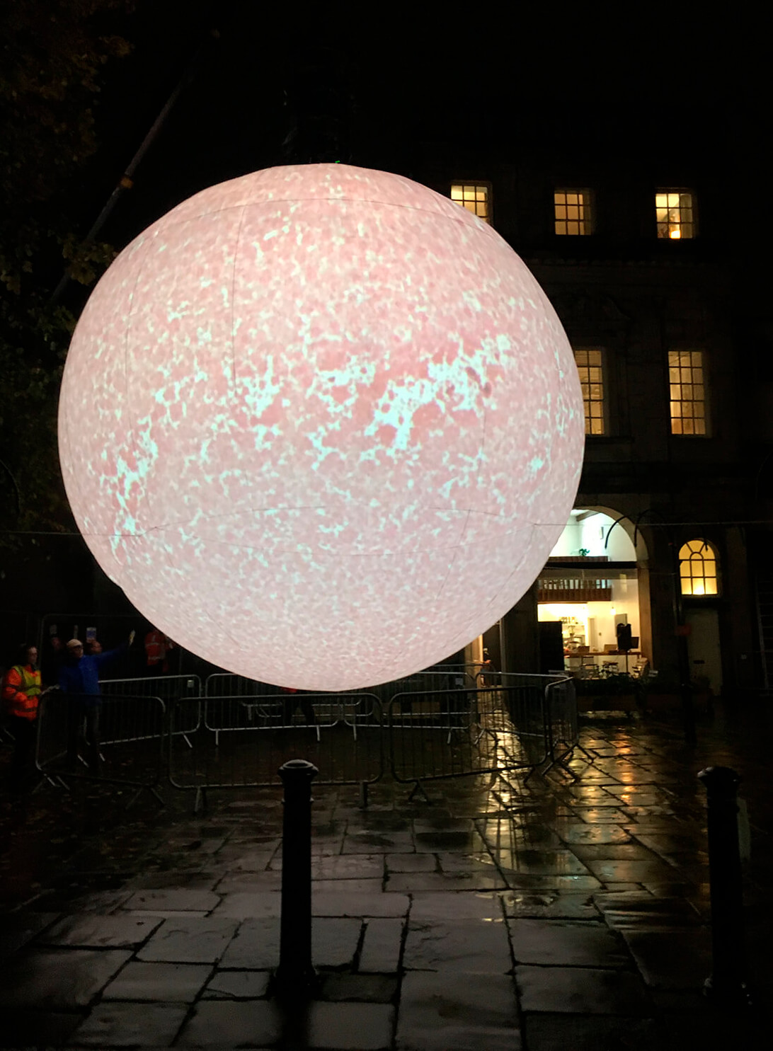 Photograph of SUN in a public space at night